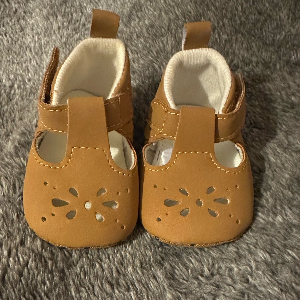 Brown suede infant shoes